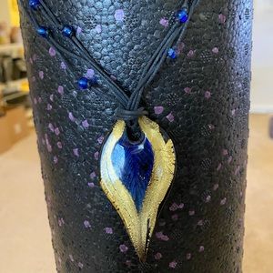 Two glass pendant necklaces red and blue